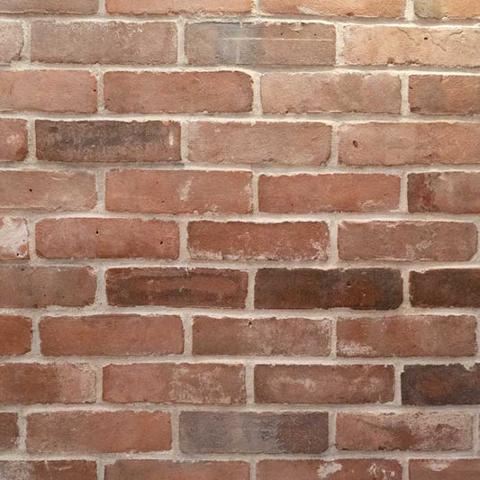 reclaimed brick wall that was created using thin brick tiles.