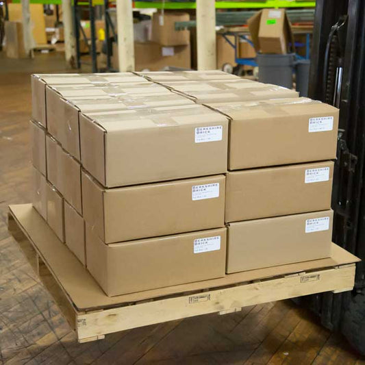 Whaling City's Brick Box's stacked on a pallet, each box contains about 40 reclaimed brick tiles. Shipment is ready to go to the customer.